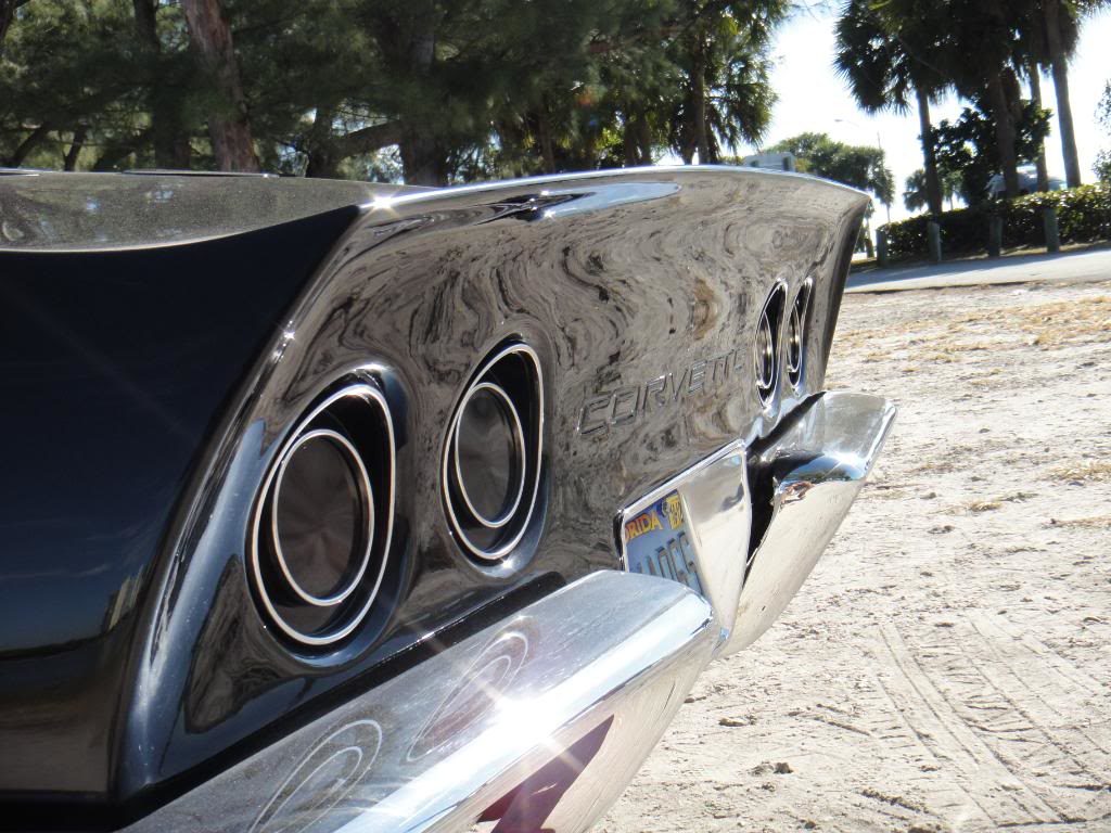 closeup black corvette rear with license plate