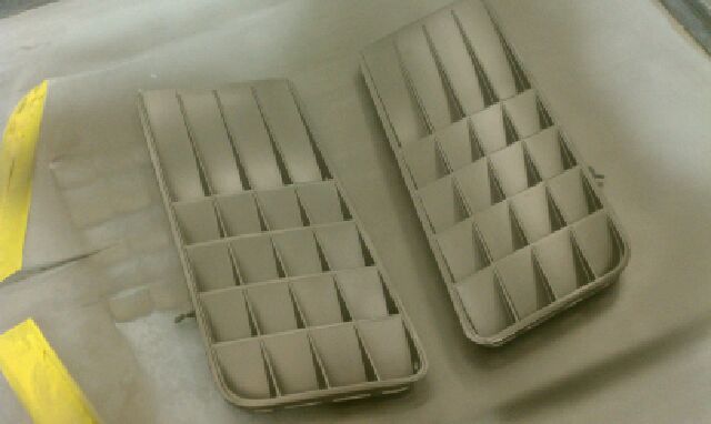 Two trays on a white color sheet at a place