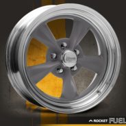 An image of a ROCKET FUEL GRAY wheel with a yellow background.