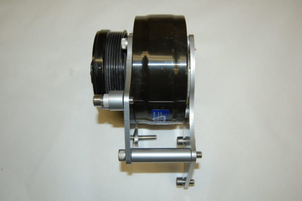 An image of the LS1 SWAP AC BRACKETS FOR THE R4 COMPRESSOR with a wheel attached to it.