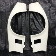 A pair of 1973-1979 CORVETTE FRONT FENDERS - 2" FLARE on a black background.