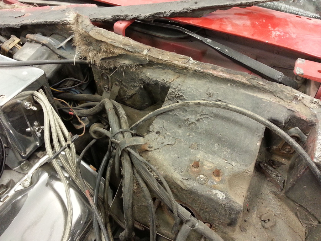 The inside of a car with a lot of wires and wires.