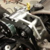 A picture of a car with LS1 SWAP AC BRAKETS FOR THE SANDEN COMPRESSOR attached to it.