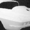 A black and white photo of a ACI 1963-1967 ONE PIECE REAR END WITH ROOF.