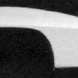 A black and white photograph of a white car.