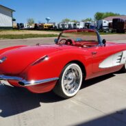 A 1958-1960 Corvette Replica Body Kit car parked on the street.