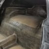 The interior of a 1963-1967 Corvette Replica Coupe is being painted.