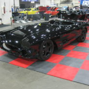 A 1962 Corvette Replica Roadster black and white checkered floor.