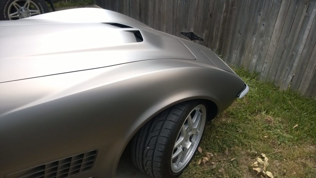 gray corvette parked in driveway 5