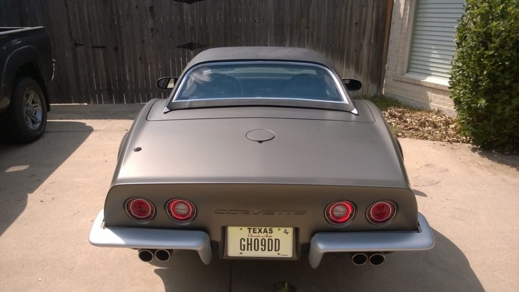 gray corvette Texas license plate