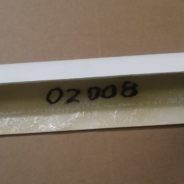 A white piece of plastic with a number on it would be the 1968-1973 REAR BUMPERS - FIBERGLASS.