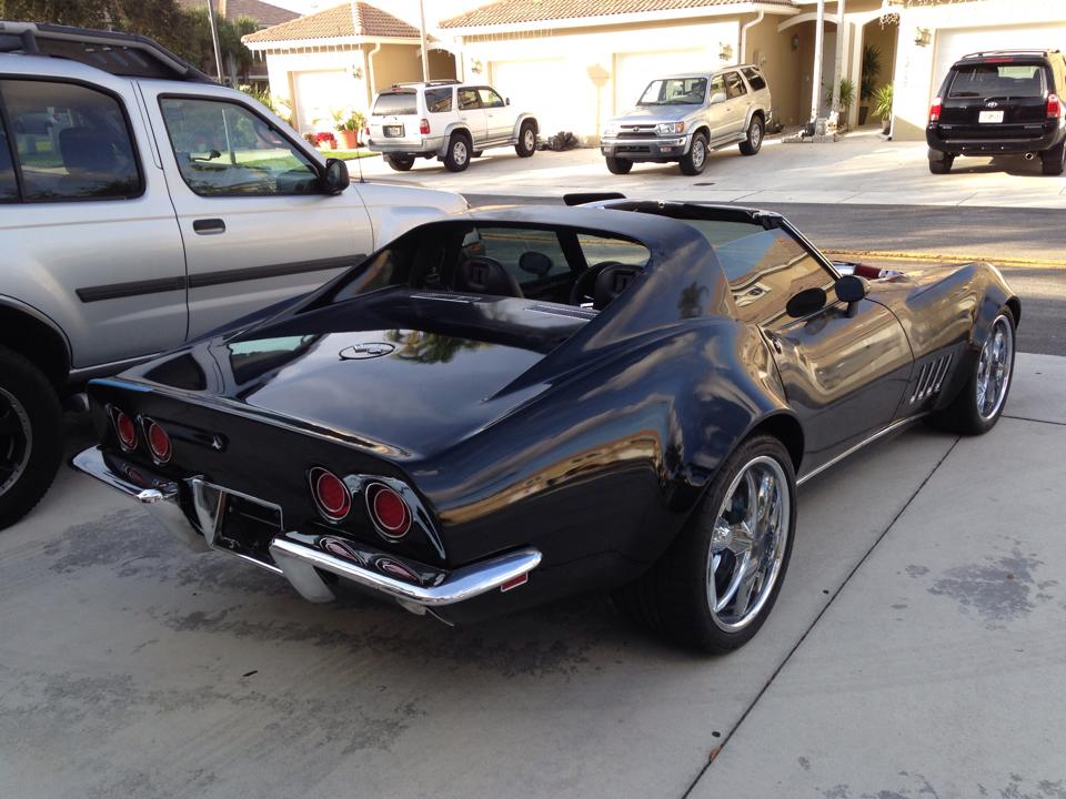 sleek black corvette