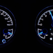 Two DAKOTA DIGITAL HDX 3-1 GAUGES in a dark room.