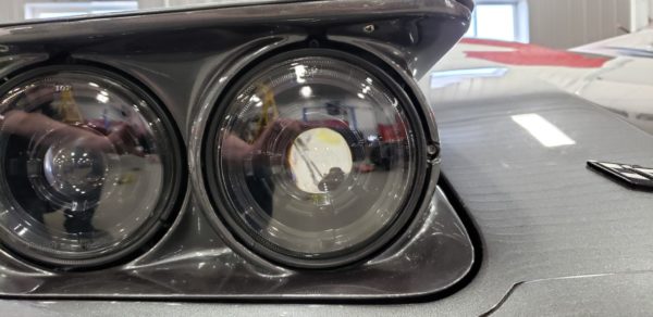 A close up of the Dapper Lighting 575 headlights of a car.
