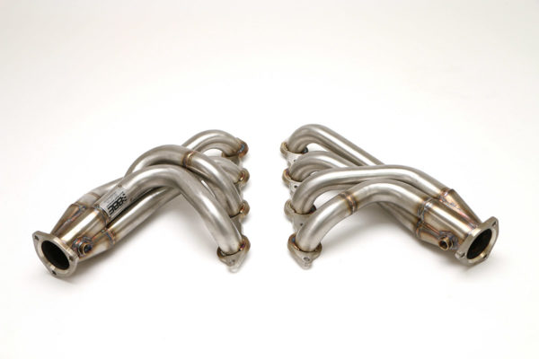 A pair of C2 / C3 Corvette LS Conversion Mid-Length Header exhaust pipes on a white background.