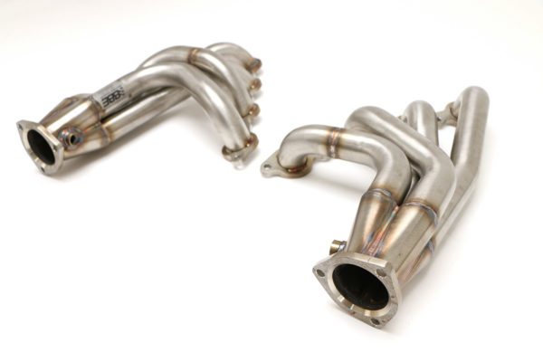 A pair of C2 / C3 Corvette LS Conversion Mid-Length Headers on a white background.