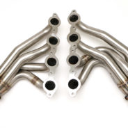 A pair of C2 / C3 Corvette LS Conversion Mid-Length Headers on a white background.