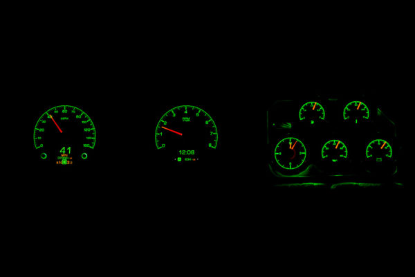 Green 1968-77 Corvette Dakota Digital HDX gauges on a black background.